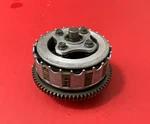 1989 - 2004 Suzuki Quadrunner 160 Oem Clutch Basket Complete Assembly Used. Price: $38.00.