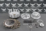 1986 Kawasaki KDX200 Oem Complete Clutch Plates Basket Hub Used. Price: $189.99.